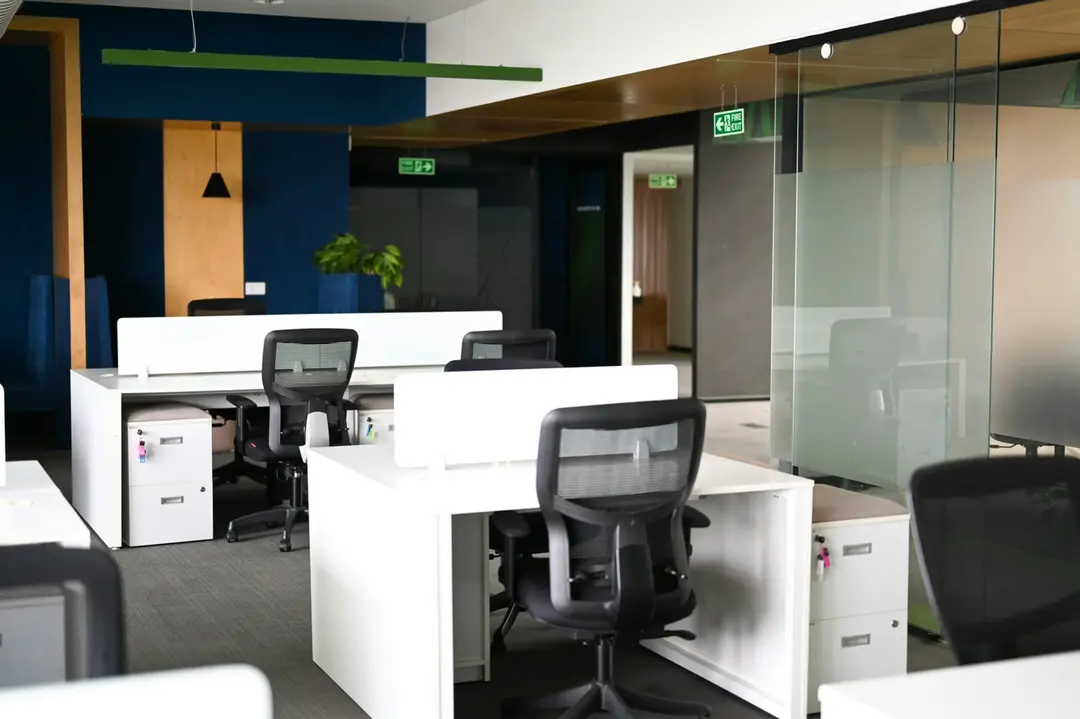 White desks and chairs in a modern office