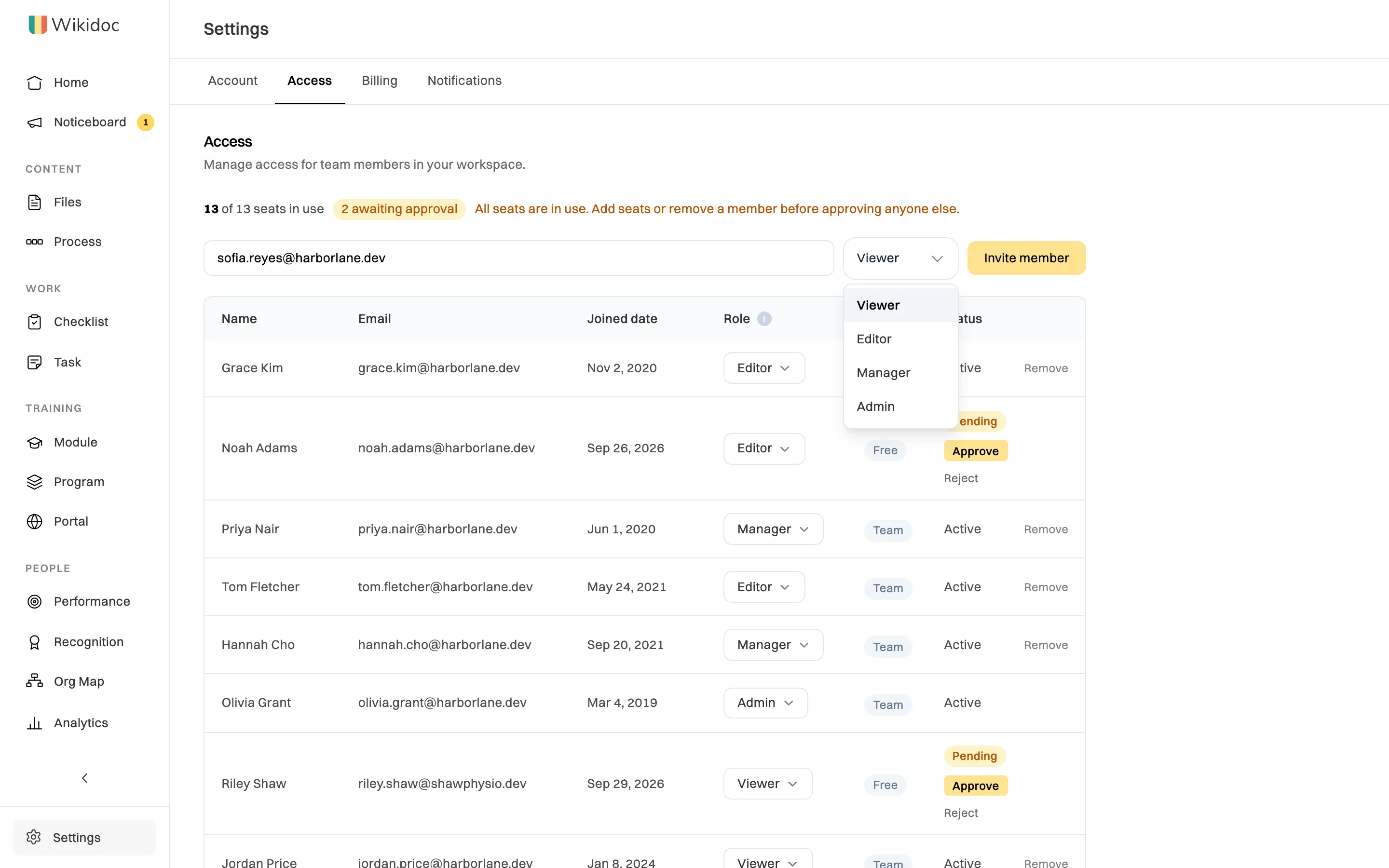 The role menu next to the email box open, listing Viewer, Editor, Manager and Admin